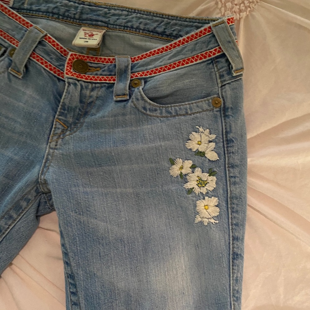 True Religion bell bottom embroiled flowers jeans.